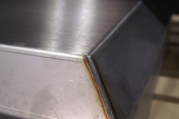 Boxes and welded structures belt finishing